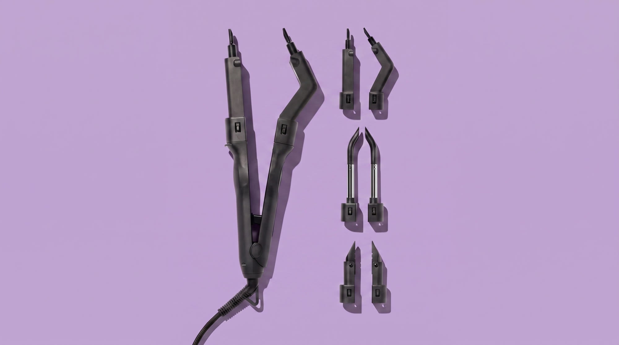 Omni-Fusion tool beside its three interchangeable tip sets on a lavender backdrop