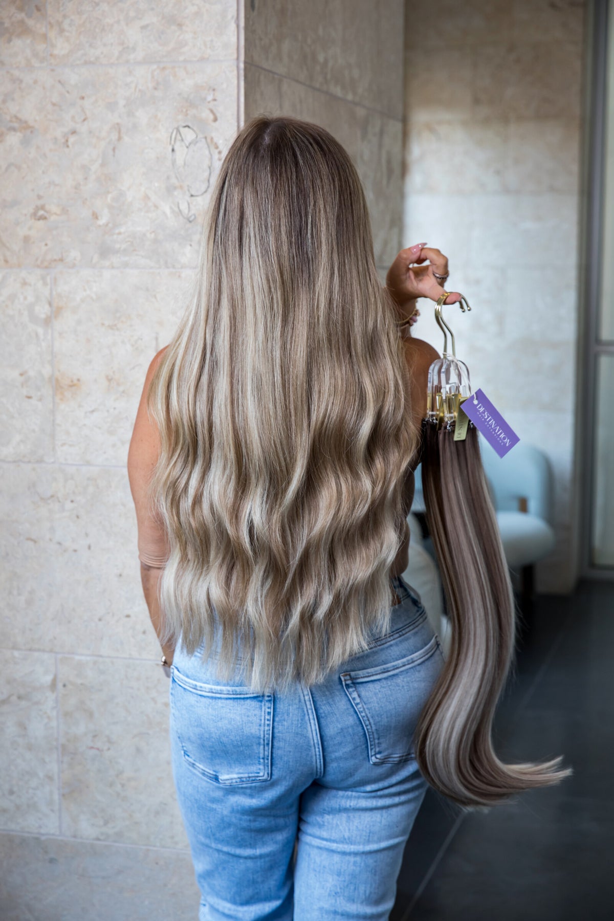 @megananton.extensions is wearing a blend of Aspen, Monaco and London Euro Genius Wefts