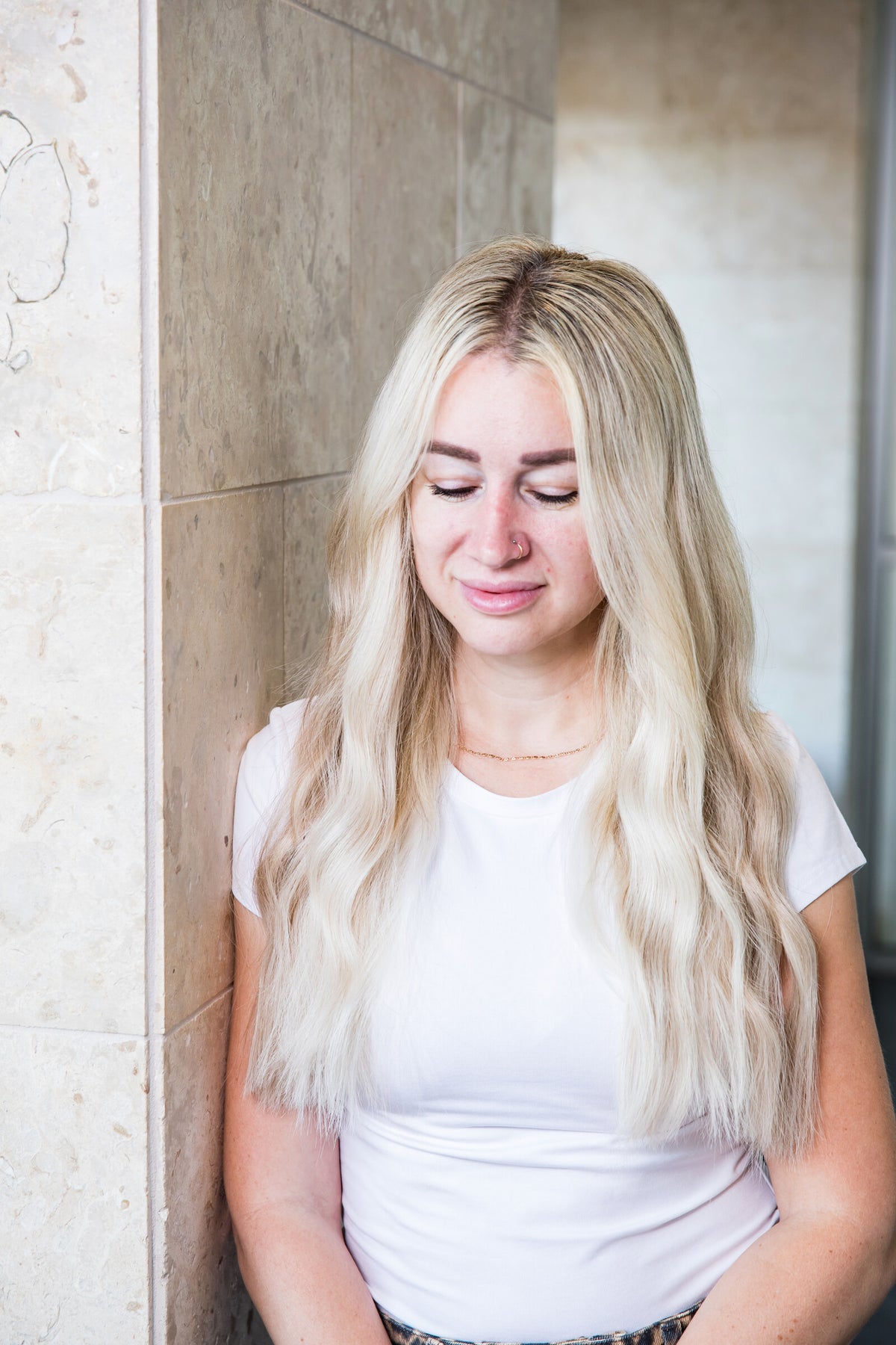 @that_blonde_stylist is wearing a blend of London, Manhattan and Berlin Euro Genius Wefts