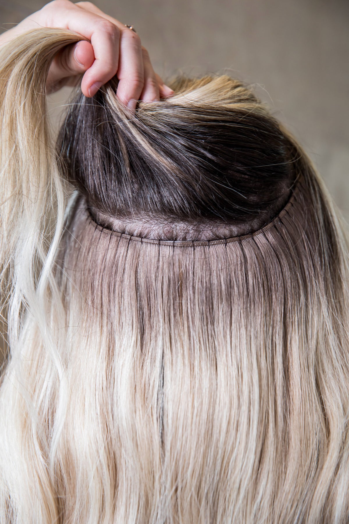 @that_blonde_stylist is wearing a blend of London, Manhattan and Berlin Euro Genius Wefts