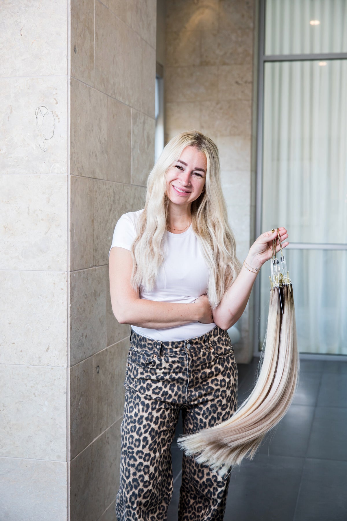 @that_blonde_stylist is wearing a blend of London, Manhattan and Berlin Euro Genius Wefts
