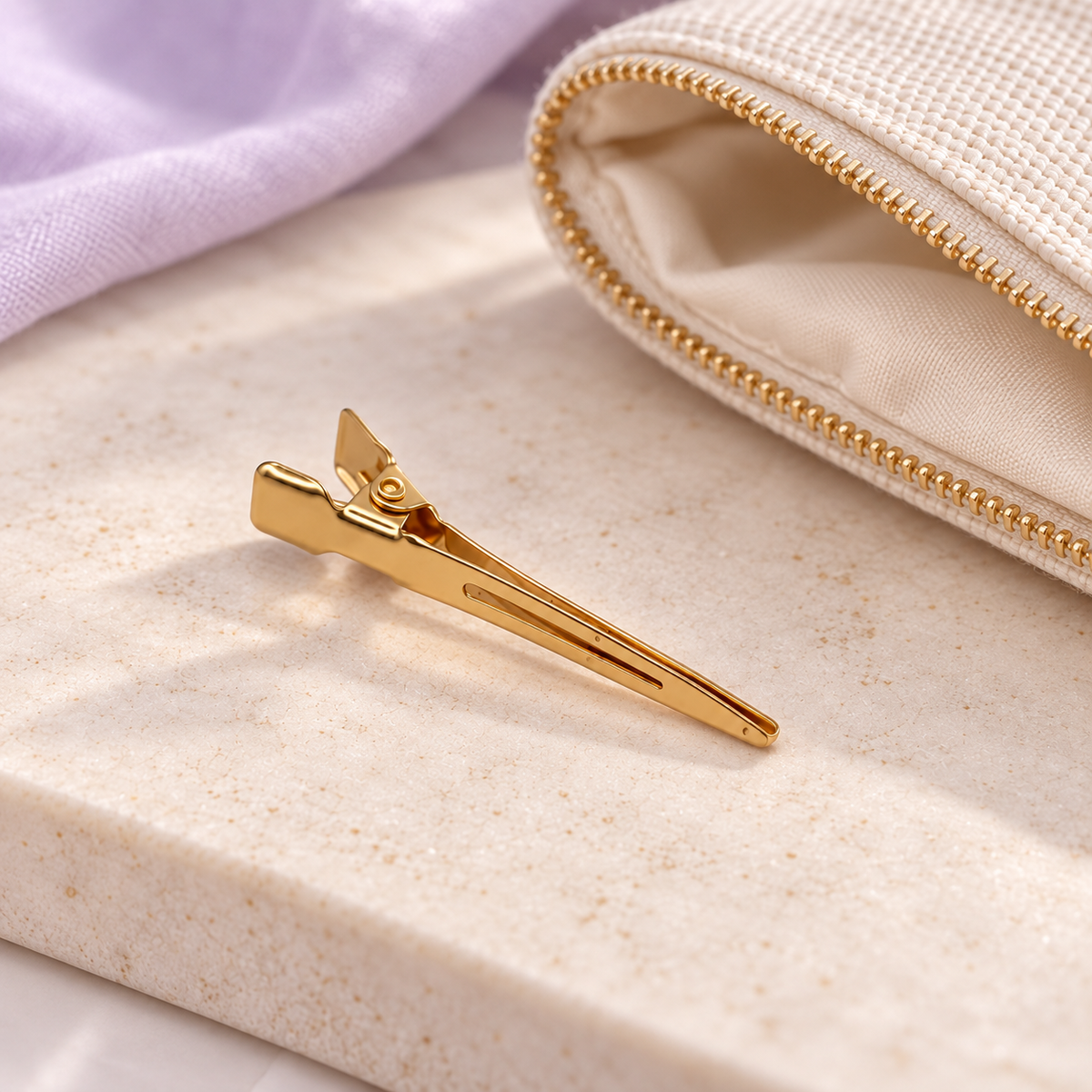 Destination Small Metal Hair Clips (20-Pack) - gold, travel flatlay, individual clip shown